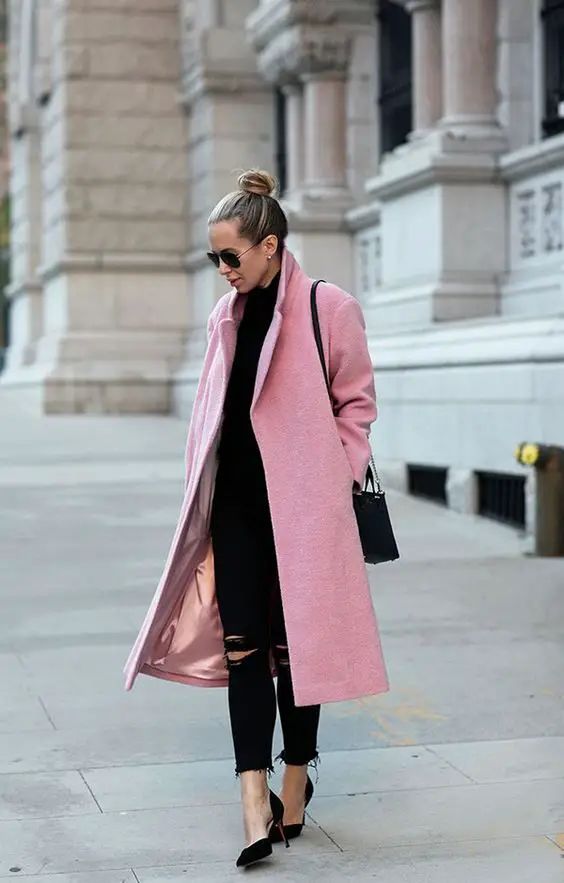 all-black-outfit-and-pink-coat