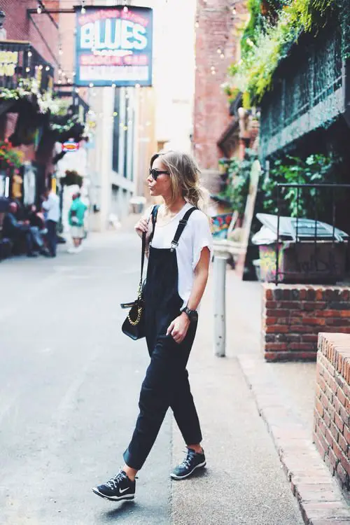 white-tee-and-black-overalls