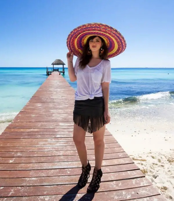 4-white-tee-with-fringed-skirt-and-colorful-hat