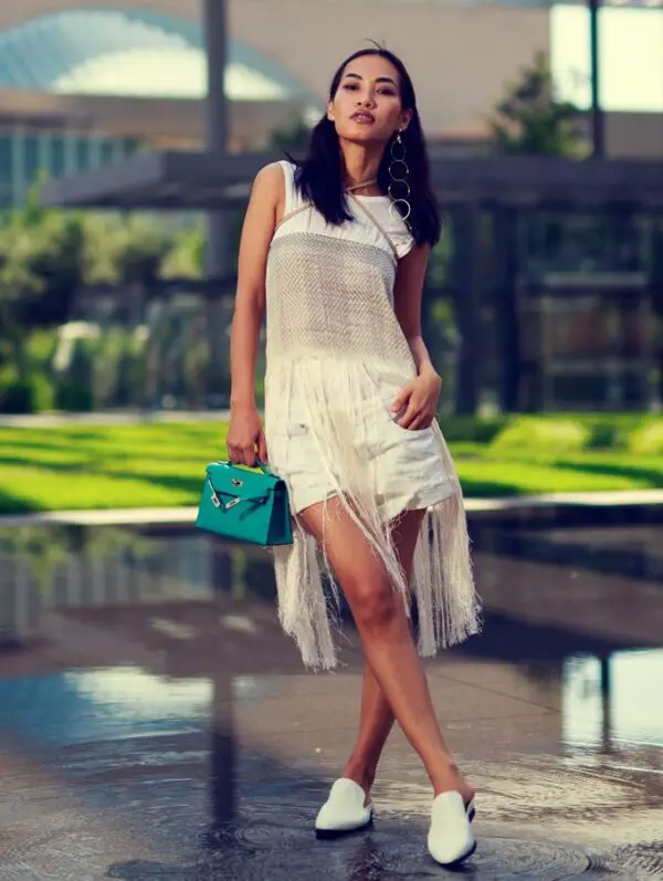 4-chain-earrings-with-clutch-bag-and-sheer-dress