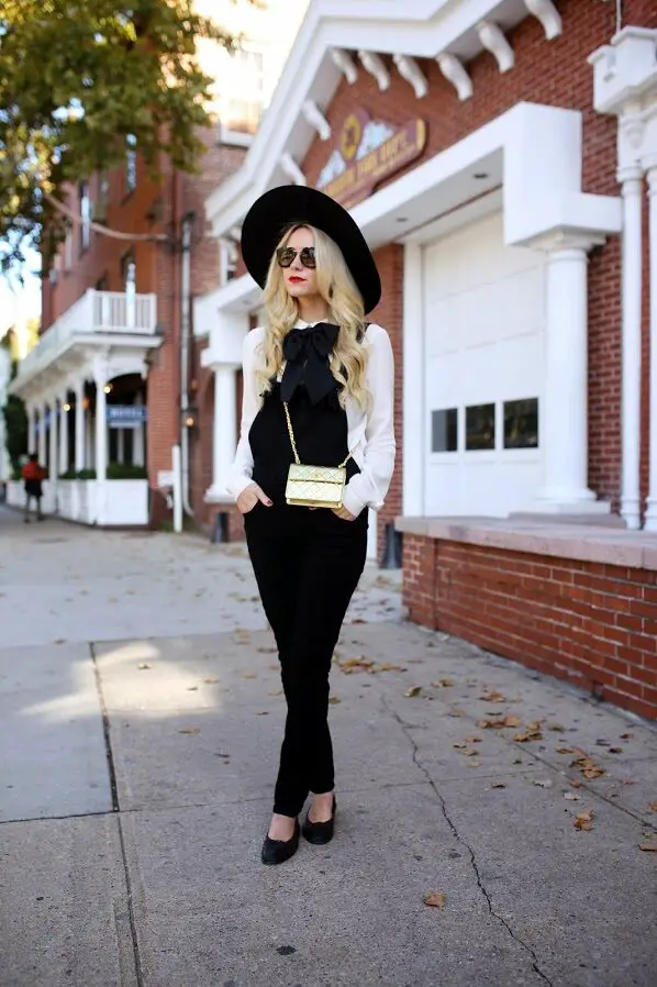 7-black-jumpsuit-with-white-pussy-bow-blouse-and-brimmed-hat