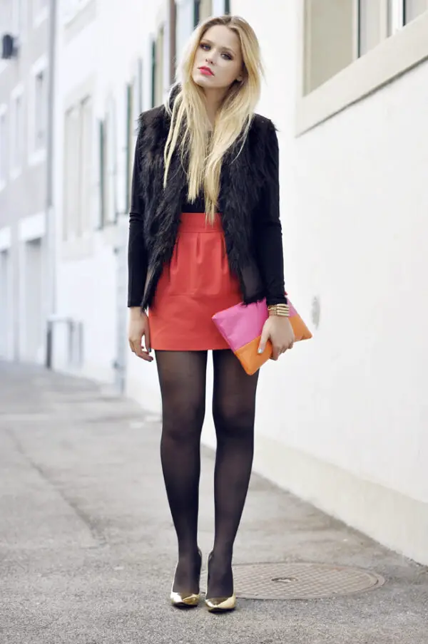 3-red-skirt-and-black-fur-coat-with-brightly-colored-envelope-clutch-and-metallic-gold-pumps