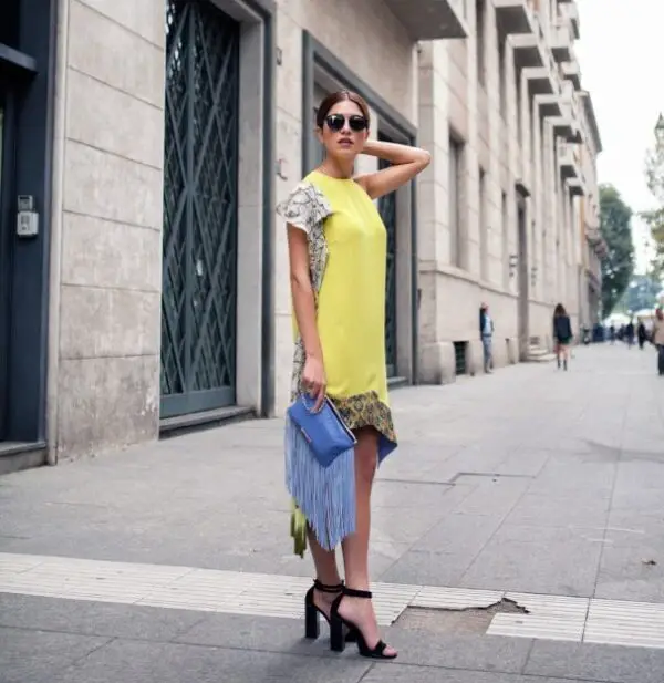 3-ruffled-yellow-dress-with-fringed-clutch