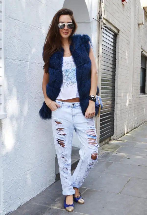 blue-fur-vest-and-ripped-jeans